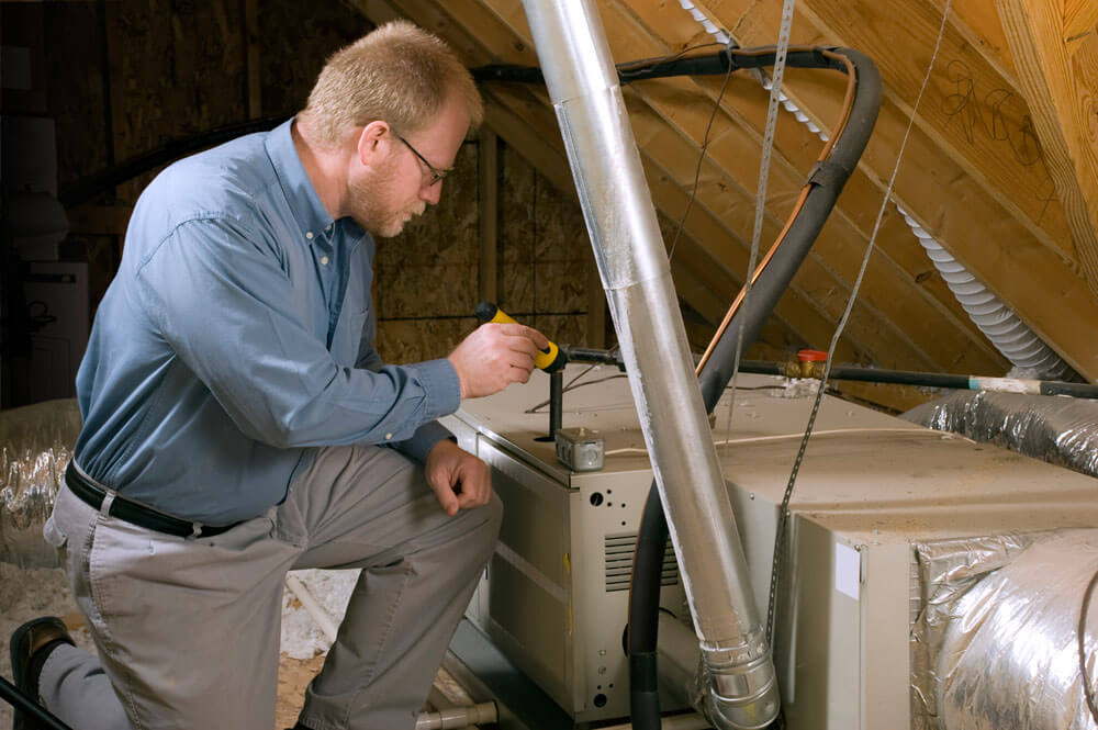 Man inspecting furnace